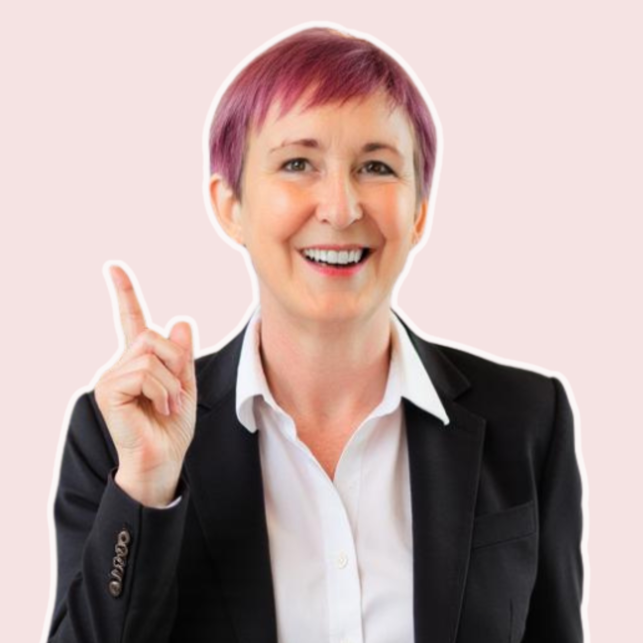 Donna Barker with a red pixie haircut smiling at the camera